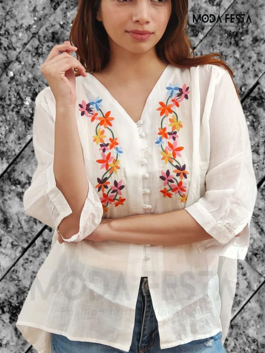 ModaFesta -embroidered-linen-v-neck-top-white-mid-lenght