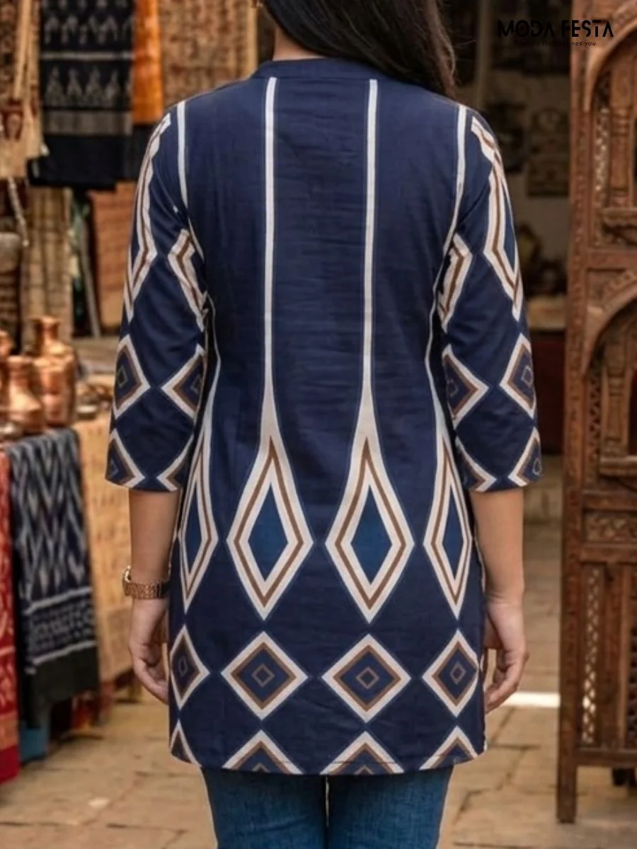 This striking navy blue kurti features a bold diamond-inspired geometric print and a neat mandarin collar, perfect for adding a sharp, modern edge to your ethnic wardrobe.