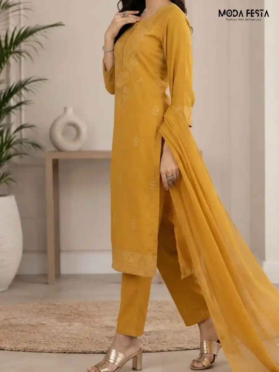 Classy Kurti Set Designed for both elegance and comfort this 3-piece set includes a gracefully embroidered straight kurta matching tailored pants and a lightweight coordinating dupatta to complete the sophisticated look