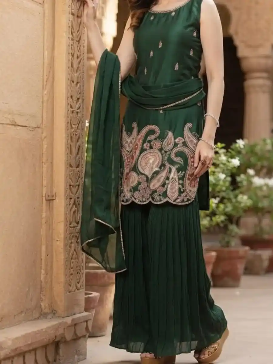 Green Shara Set Designed for elegance and comfort the sleeveless top features subtle detailing and a gorgeous intricate traditional embroidered motif along the lower front