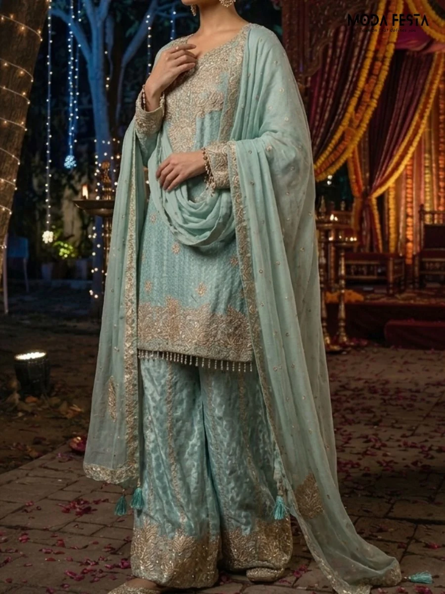 Elegantly crafted pastel blue co-ord set featuring intricate gold embroidery and a matching dupatta, perfect for festive occasions.