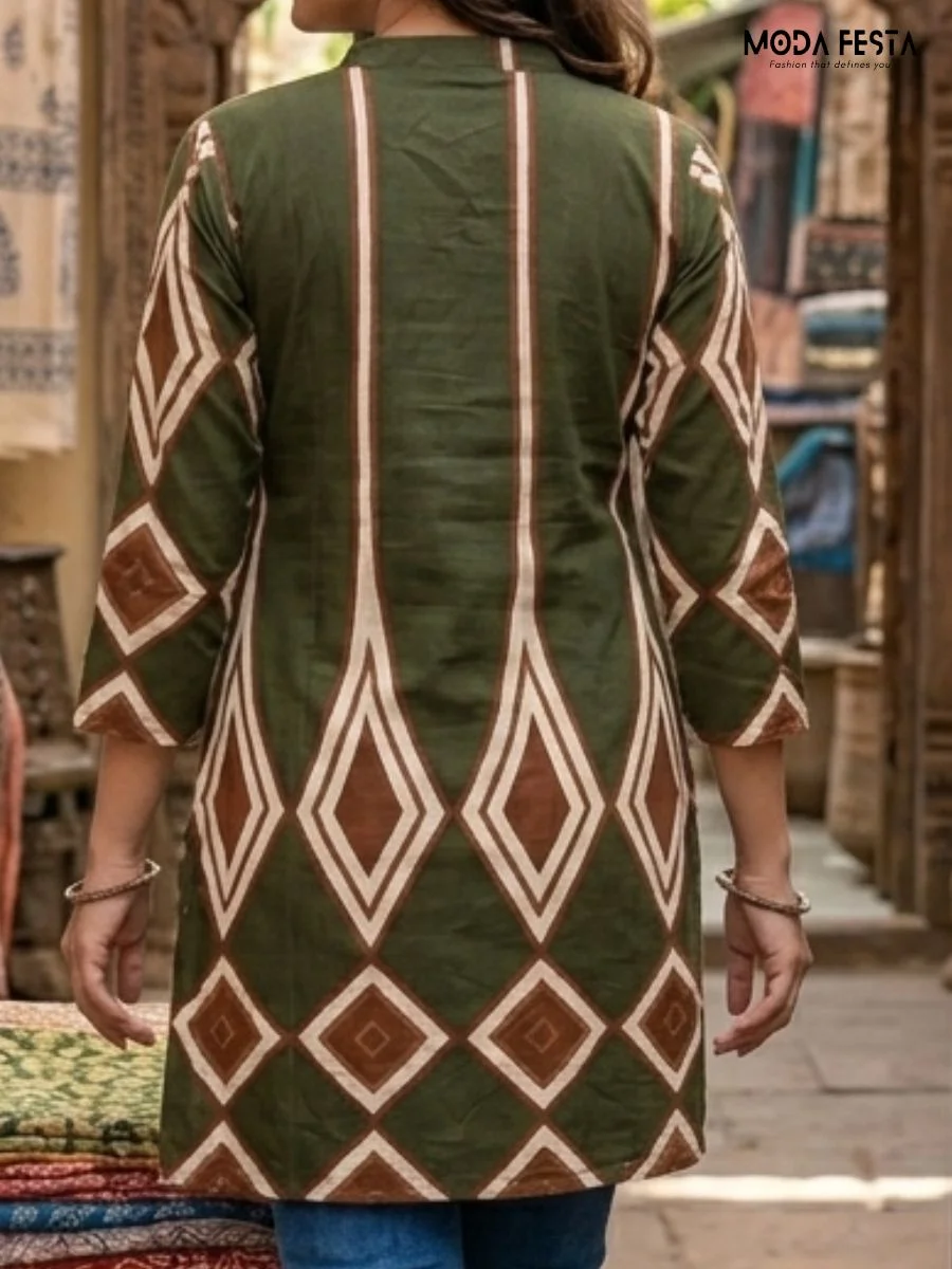 A stylish green kurti featuring a striking geometric diamond print, perfect for a modern ethnic look.