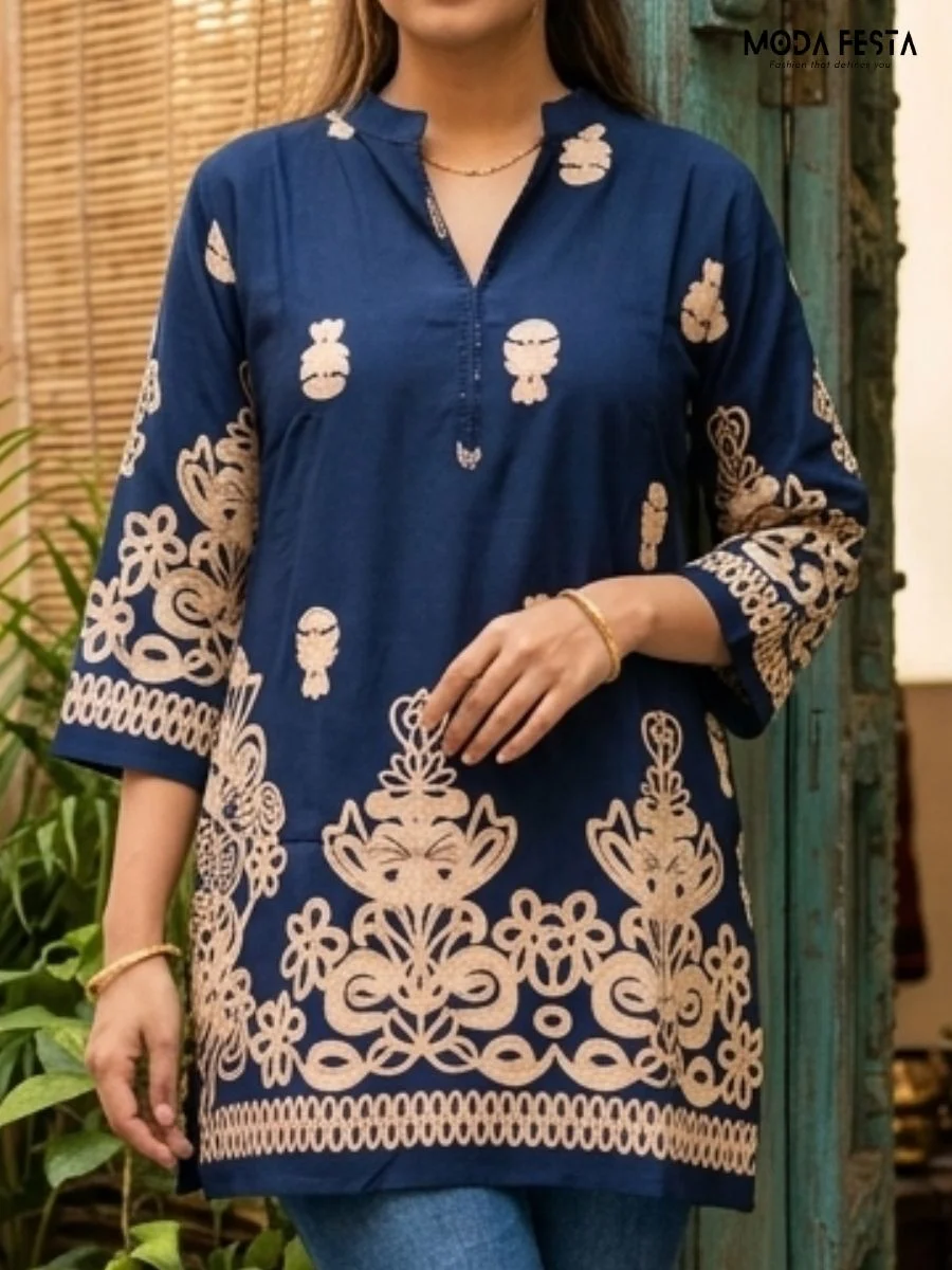 Make a statement with this elegant navy blue kurta, featuring intricate beige embroidery and a sophisticated band-collar neckline.
