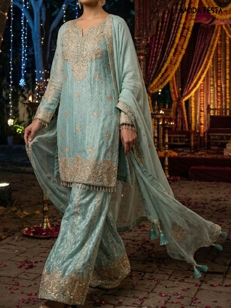 Elegantly crafted pastel blue co-ord set featuring intricate gold embroidery and a matching dupatta, perfect for festive occasions.