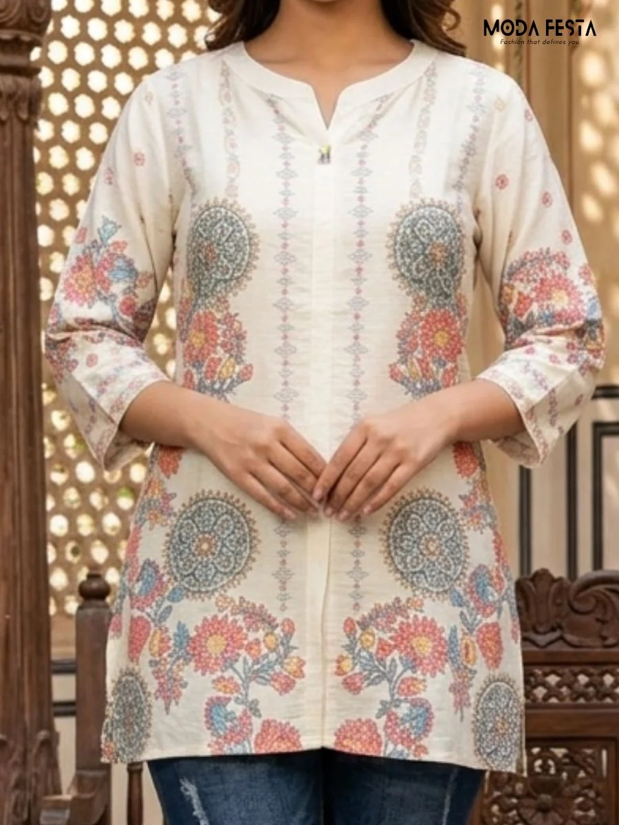 This elegant off-white kurti features a sophisticated mandala and botanical floral print, offering a graceful and versatile choice for daily ethnic wear.