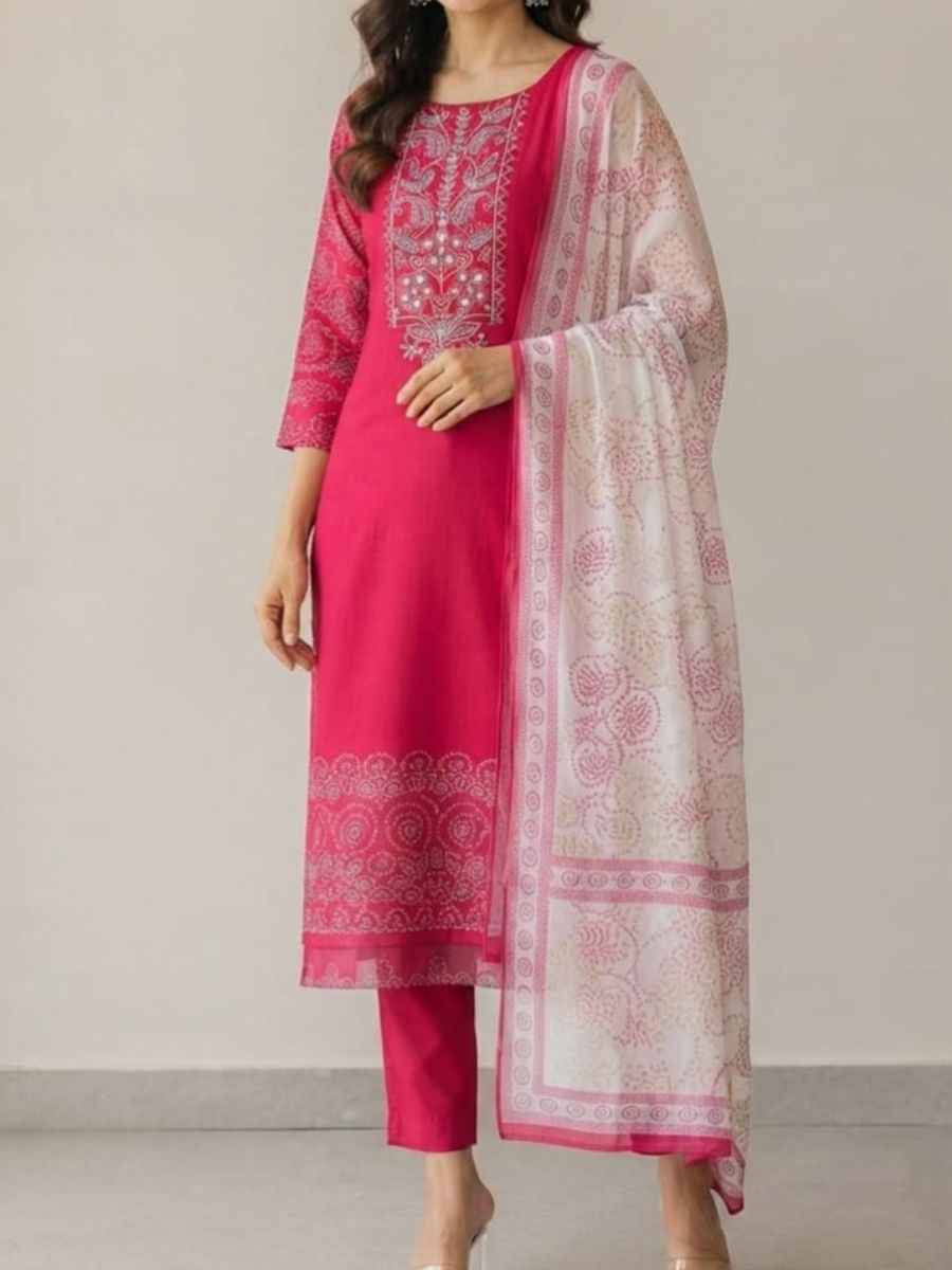 Pink Kurti Set Featuring intricate white embroidery along the neckline and detailed traditional patterns near the hem this elegant knee-length kurta is paired with matching tailored trousers