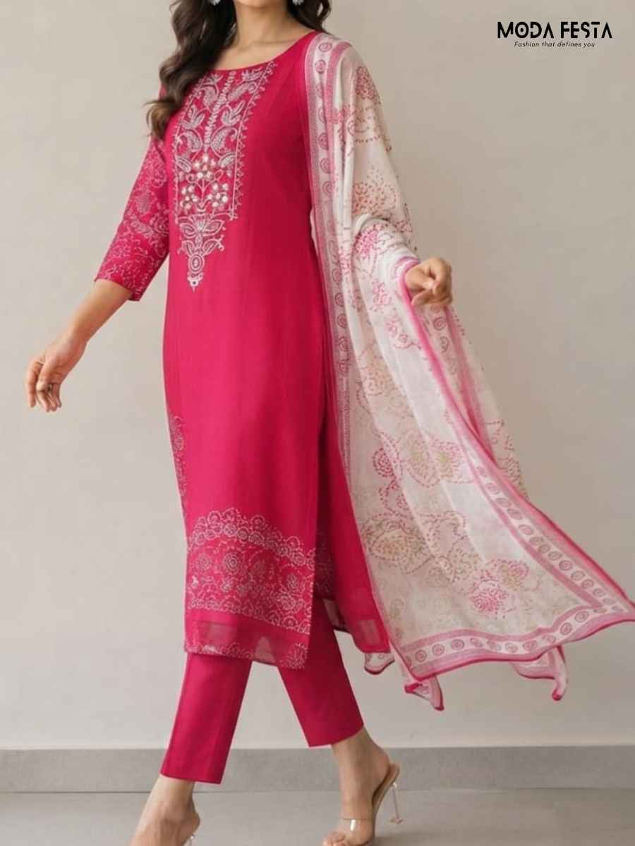 Pink Kurti Set Featuring intricate white embroidery along the neckline and detailed traditional patterns near the hem this elegant knee-length kurta is paired with matching tailored trousers