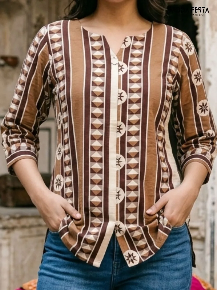 This elegant brown kurti features a bold, vertical geometric pattern that combines traditional ethnic style with a modern, relaxed fit.