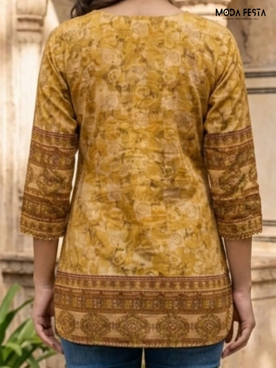 his warm-toned mustard kurti showcases a beautiful blend of geometric and swirl patterns with delicate button detailing