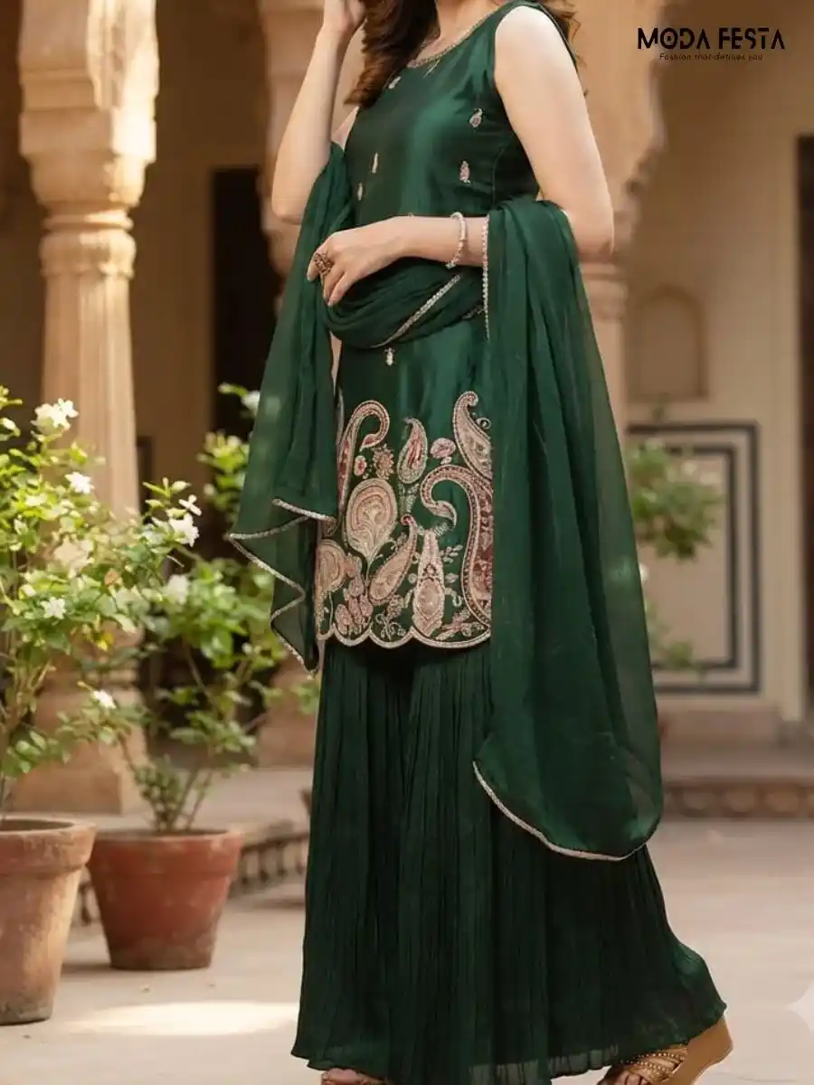 Green Shara Set Designed for elegance and comfort the sleeveless top features subtle detailing and a gorgeous intricate traditional embroidered motif along the lower front