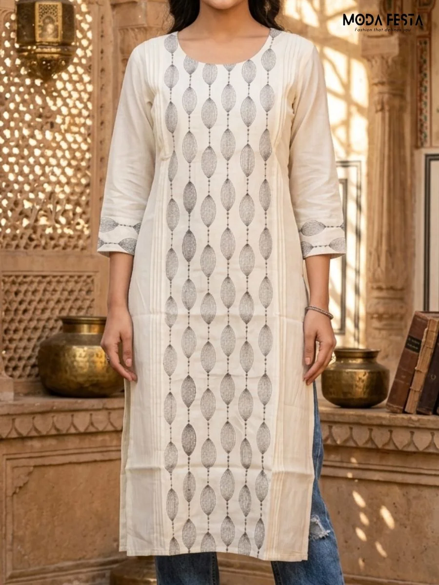 This elegant ivory-hued kurti is defined by a clean, sophisticated aesthetic, featuring a vertically aligned geometric oval pattern that creates a modern and elongating silhouette.